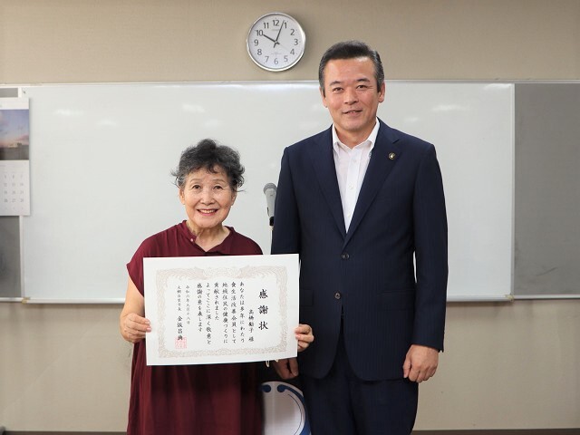 高橋勵子（たかはしれいこ）さんと市長の写真